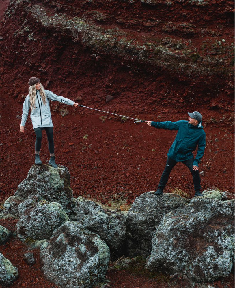 couple pulling adjustable bungee cord