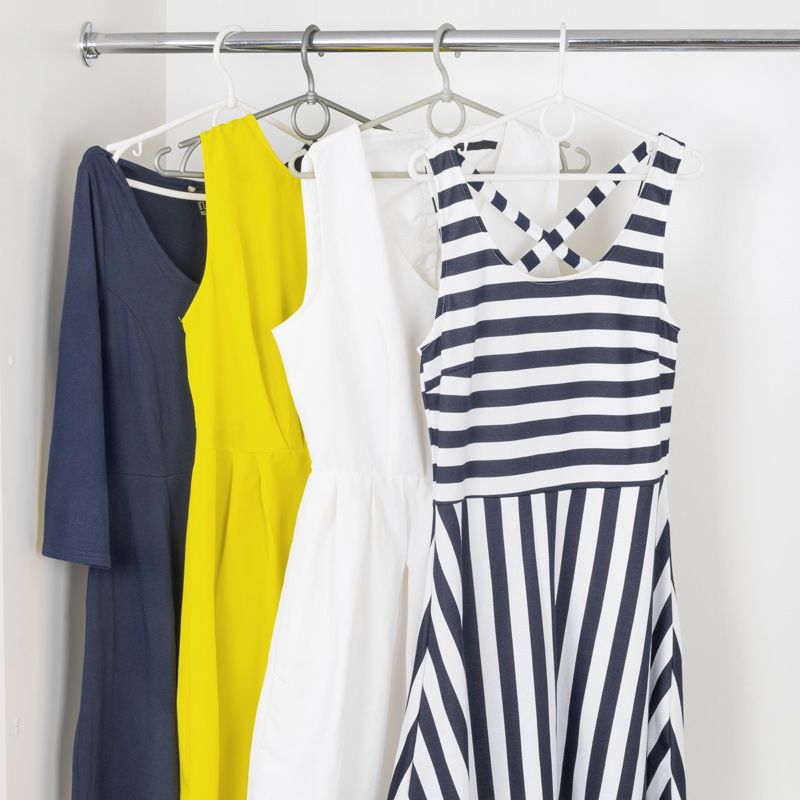 Dresses hanging from closet rod