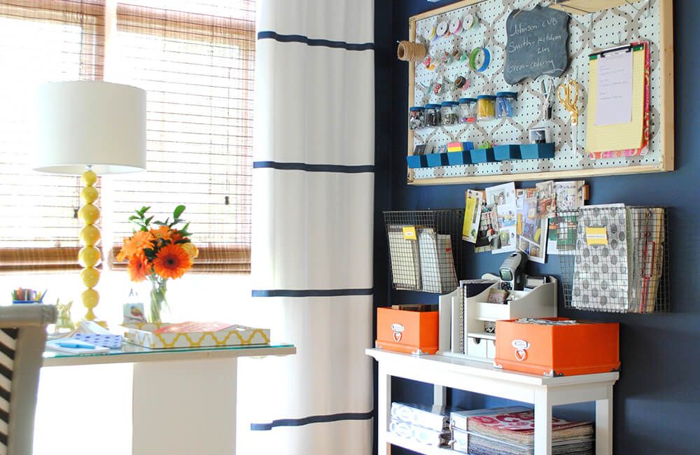 Organized Room with pegboard and lamp